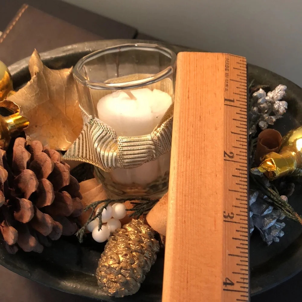Floral, candle arrangement. Dark green, gold, silver. Votive vanilla candle